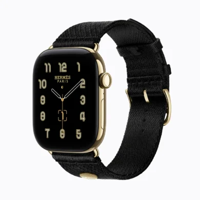 Apple Watch Series 12 Radiant Gold with Noir Hermes Satin Clou de Selle Band Apple Watch Series 12 warna Radiant Gold dengan tali Hermes Noir Satin Clou de Selle